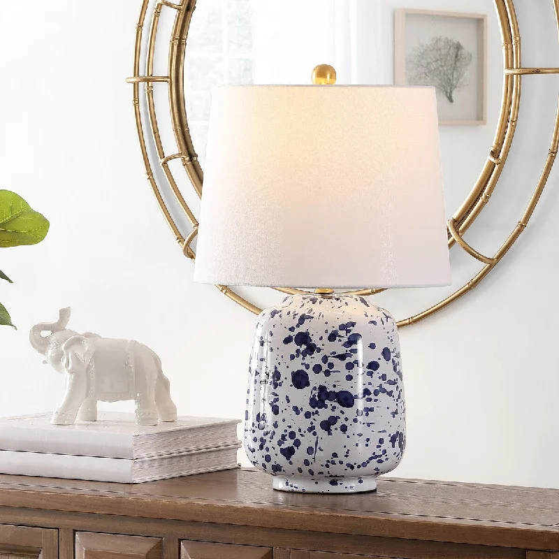 wooden table lamps with natural grain for a warm and organic feelwooden table lamps with natural grain for a warm and organic feelSAFAVIEH Lighting Alyona Navy Blue 23-inch Ceramic LED Table Lamp - 14" W x 12" L x 23" H - 14Wx12Dx23H