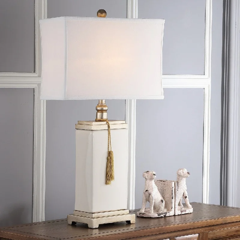 rustic farmhouse table lamps for cozy kitchensrustic farmhouse table lamps for cozy kitchensSAFAVIEH Lighting Ganna 30-inch Cream/Gold Tassel Table Lamp - 16.5"x9"x32" - 17Wx9Dx32H