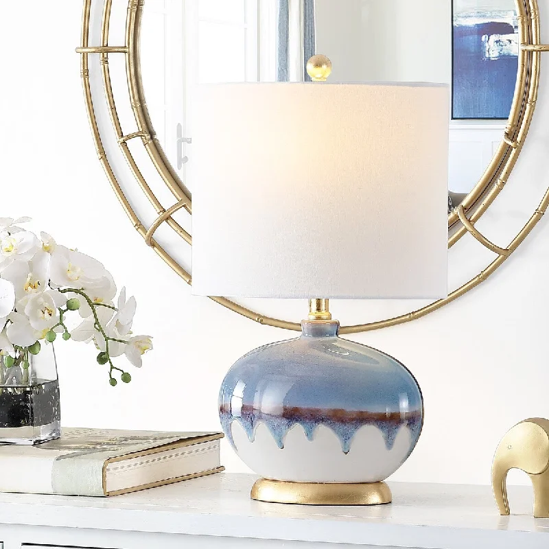 metal table lamps with a matte black finish for a sleek appearancemetal table lamps with a matte black finish for a sleek appearanceSAFAVIEH Lighting Lelioara Blue 21-inch Ceramic LED Table Lamp - 13" W x 8" L x 21" H - 13Wx8Dx21H metal table lamps with a matte black finish for a sleek appearancemetal table lamps with a matte black finish for a sleek appearanceSAFAVIEH Lighting Lelioara Blue 21-inch Ceramic LED Table Lamp - 13" W x 8" L x 21" H - 13Wx8Dx21H