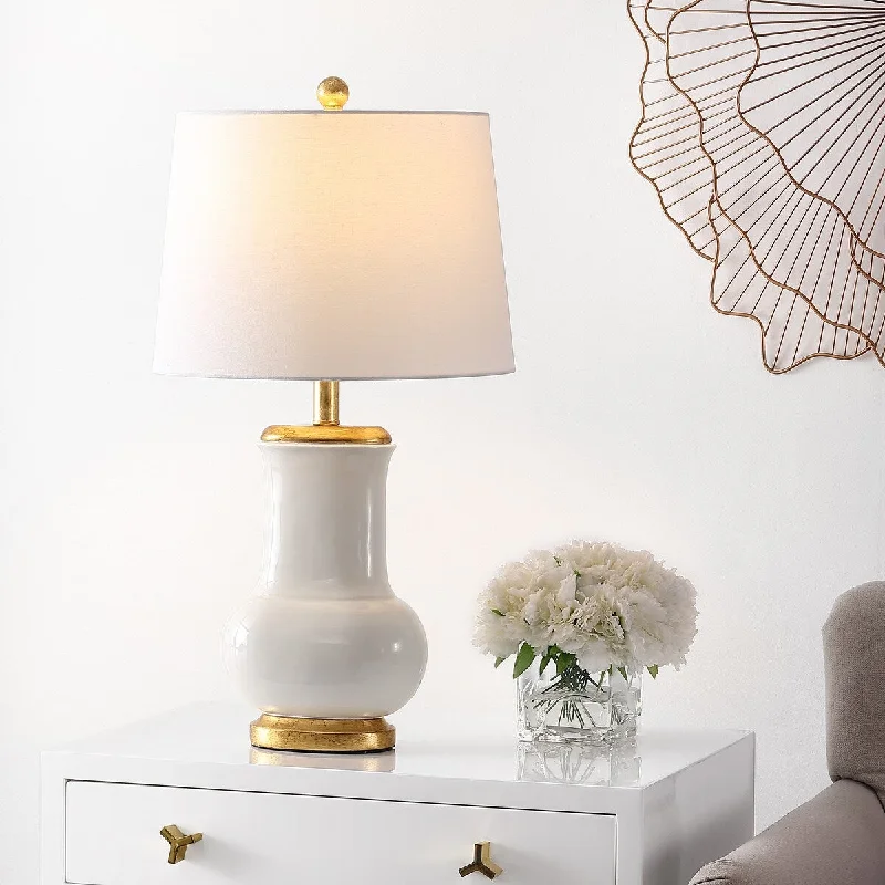 wooden table lamps with natural grain for a warm and organic feelwooden table lamps with natural grain for a warm and organic feelSAFAVIEH Lighting Mukhayyo 25" Table Lamp - 14" W x 14" D x 24" H - 14Wx14Dx24H wooden table lamps with natural grain for a warm and organic feelwooden table lamps with natural grain for a warm and organic feelSAFAVIEH Lighting Mukhayyo 25" Table Lamp - 14" W x 14" D x 24" H - 14Wx14Dx24H