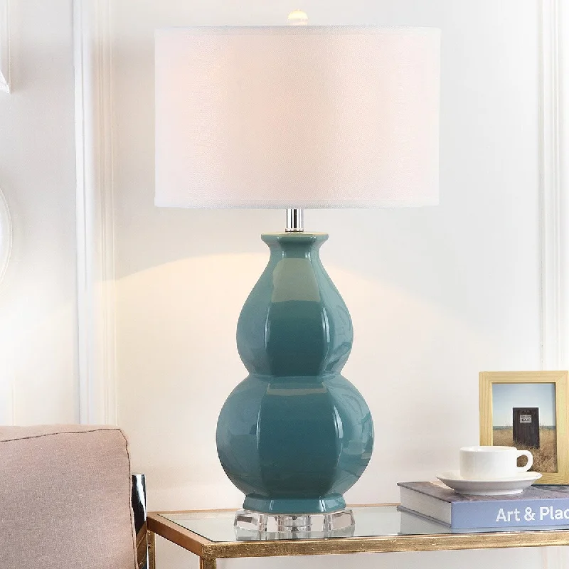 wooden table lamps with natural grain for a warm and organic feelwooden table lamps with natural grain for a warm and organic feelSAFAVIEH Lighting Shona 30-inch Egg Blue Table Lamp - 16"x16"x30" - 16Wx16Dx30H